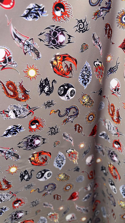 New Exotic Dragon and Fire Skull design print on nylon spandex 4-way 58/60” Sold by the YD. Ships worldwide from Los Ángeles California USA.