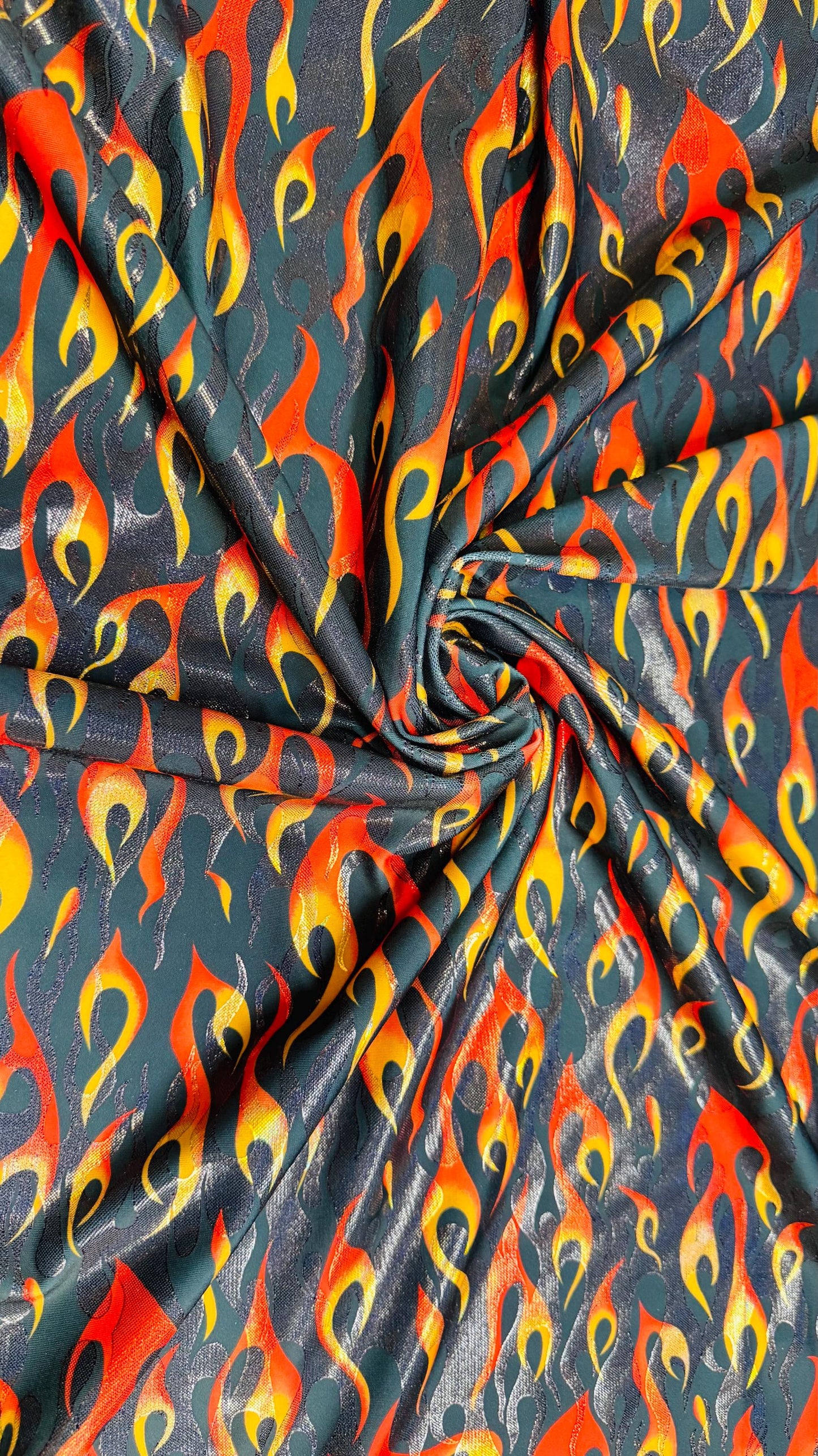 New Hot flames design metallic nylon spandex with foggy foil 4-way stretch 58/60” Sold by the YD. Ships Worldwide from Los Angeles CA USA