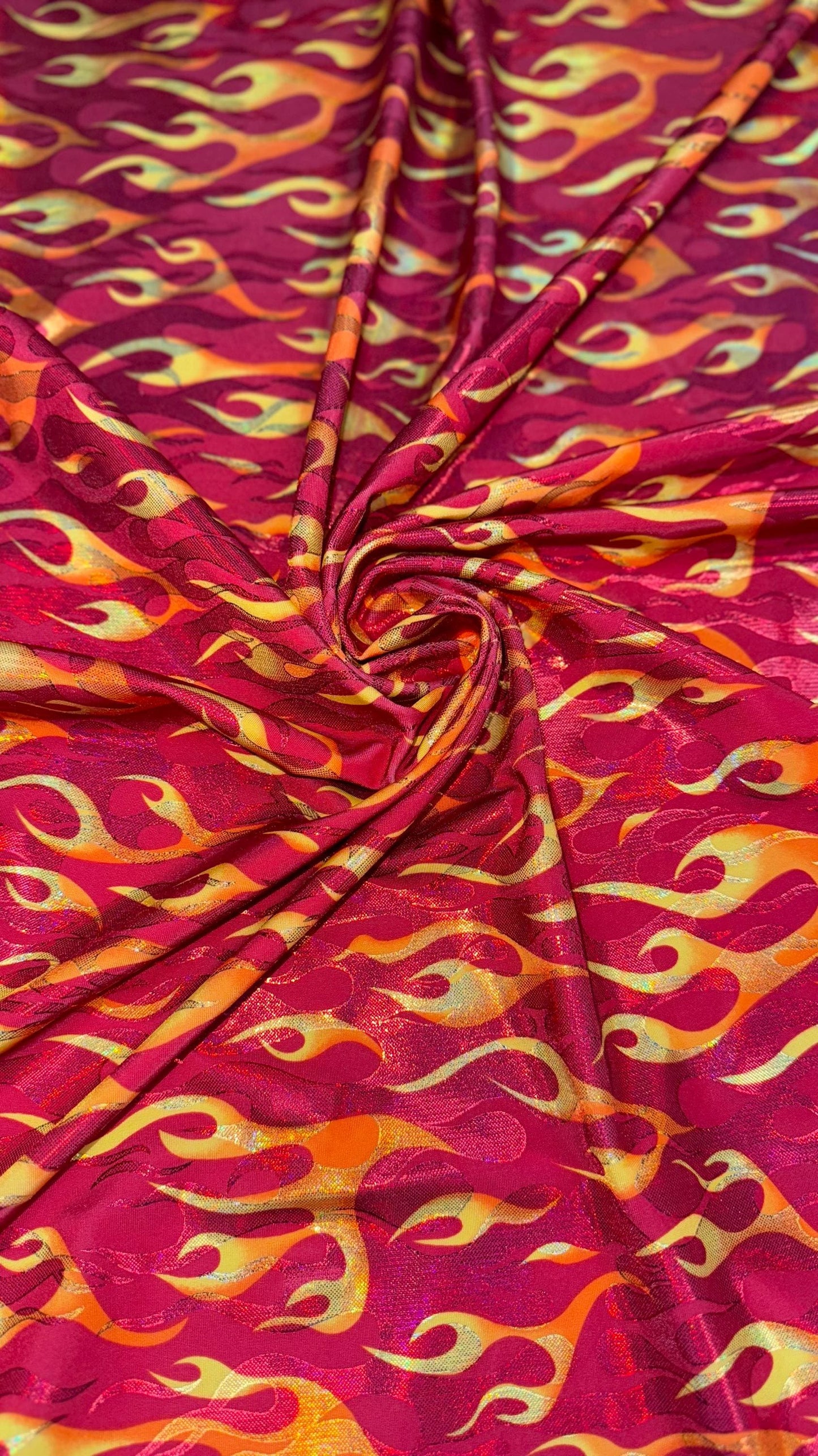 New Hot flames design metallic nylon spandex with foggy foil 4-way stretch 58/60” Sold by the YD. Ships Worldwide from Los Angeles CA USA