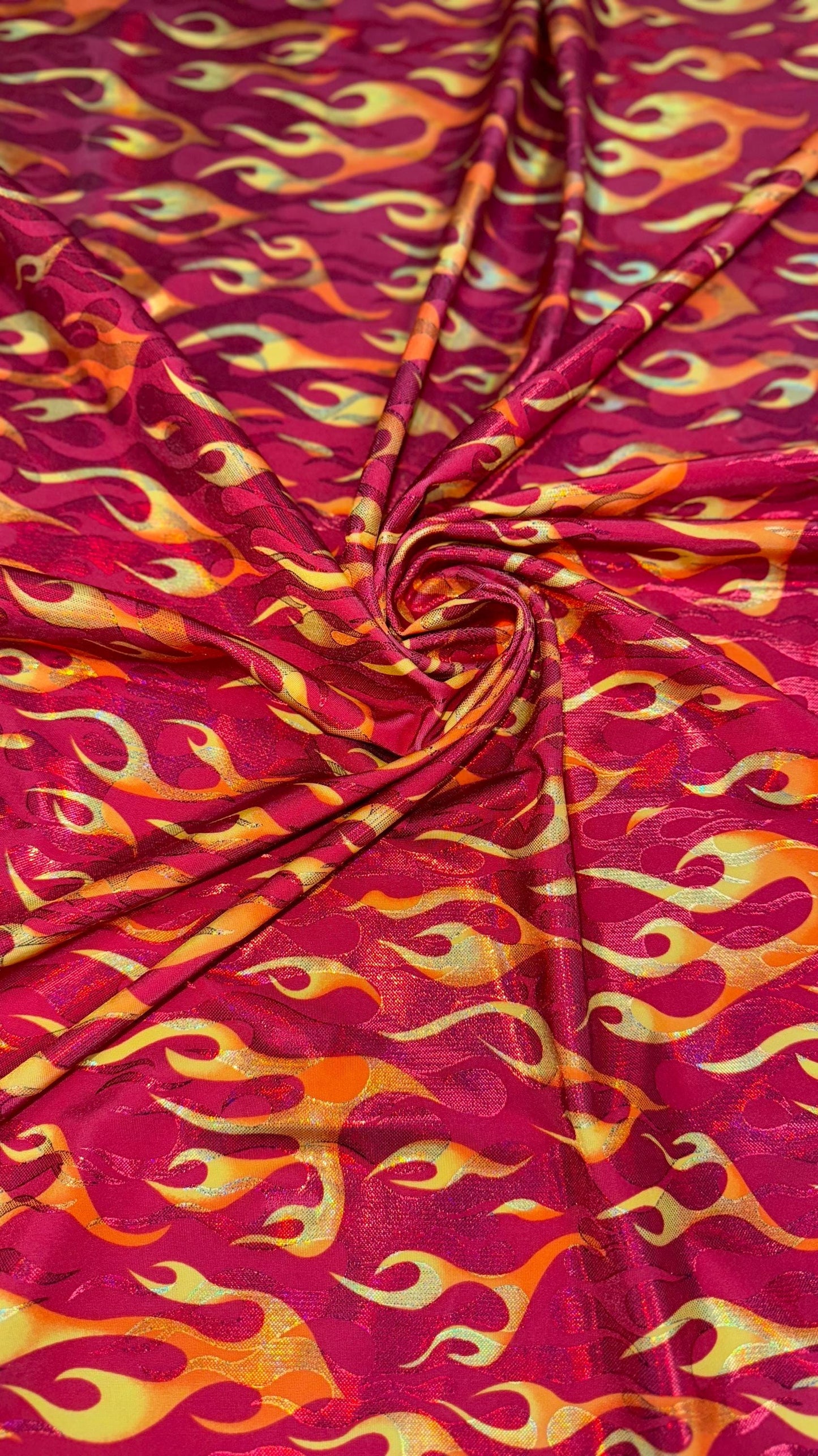 New Hot flames design metallic nylon spandex with foggy foil 4-way stretch 58/60” Sold by the YD. Ships Worldwide from Los Angeles CA USA