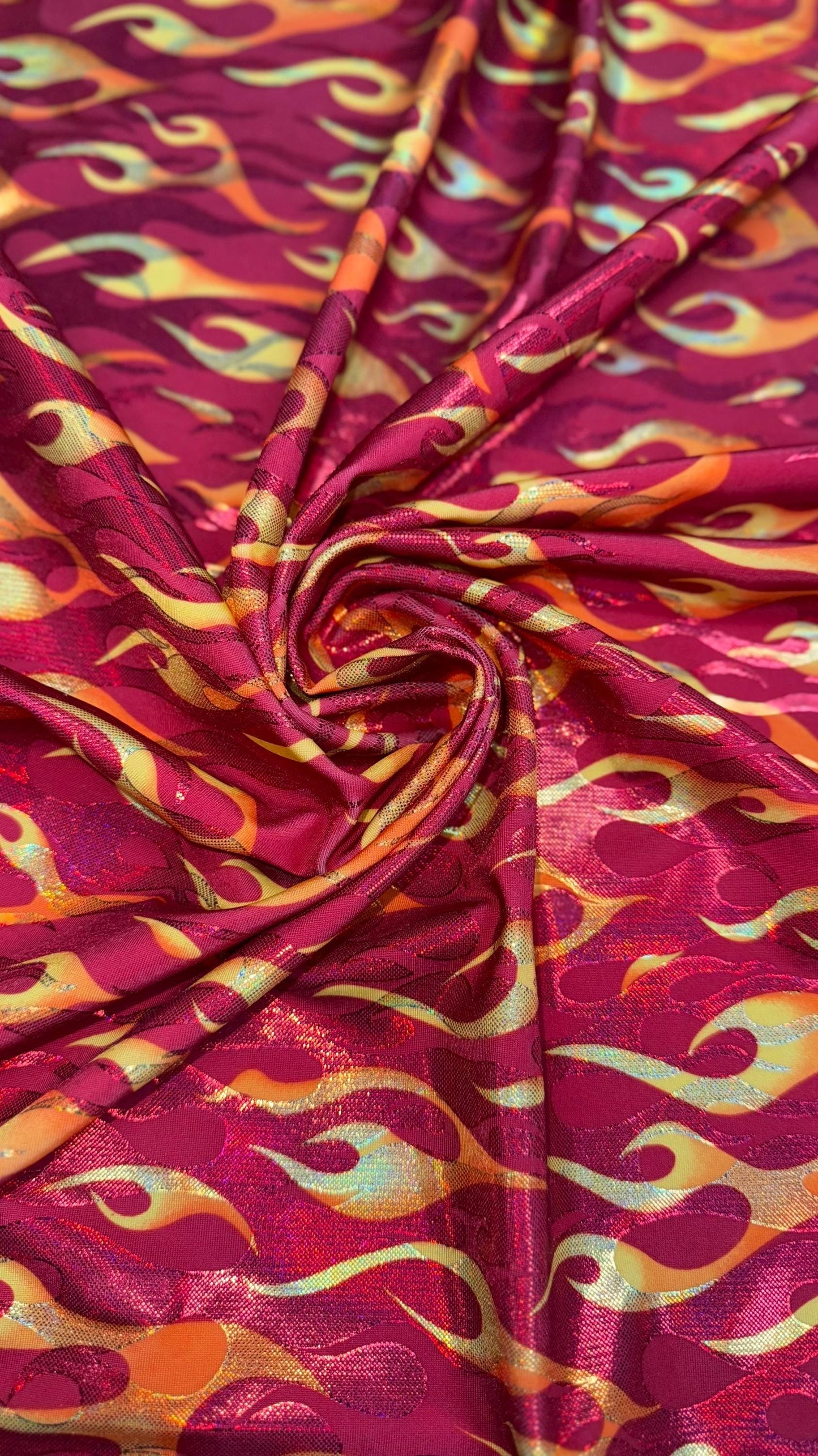 New Hot flames design metallic nylon spandex with foggy foil 4-way stretch 58/60” Sold by the YD. Ships Worldwide from Los Angeles CA USA