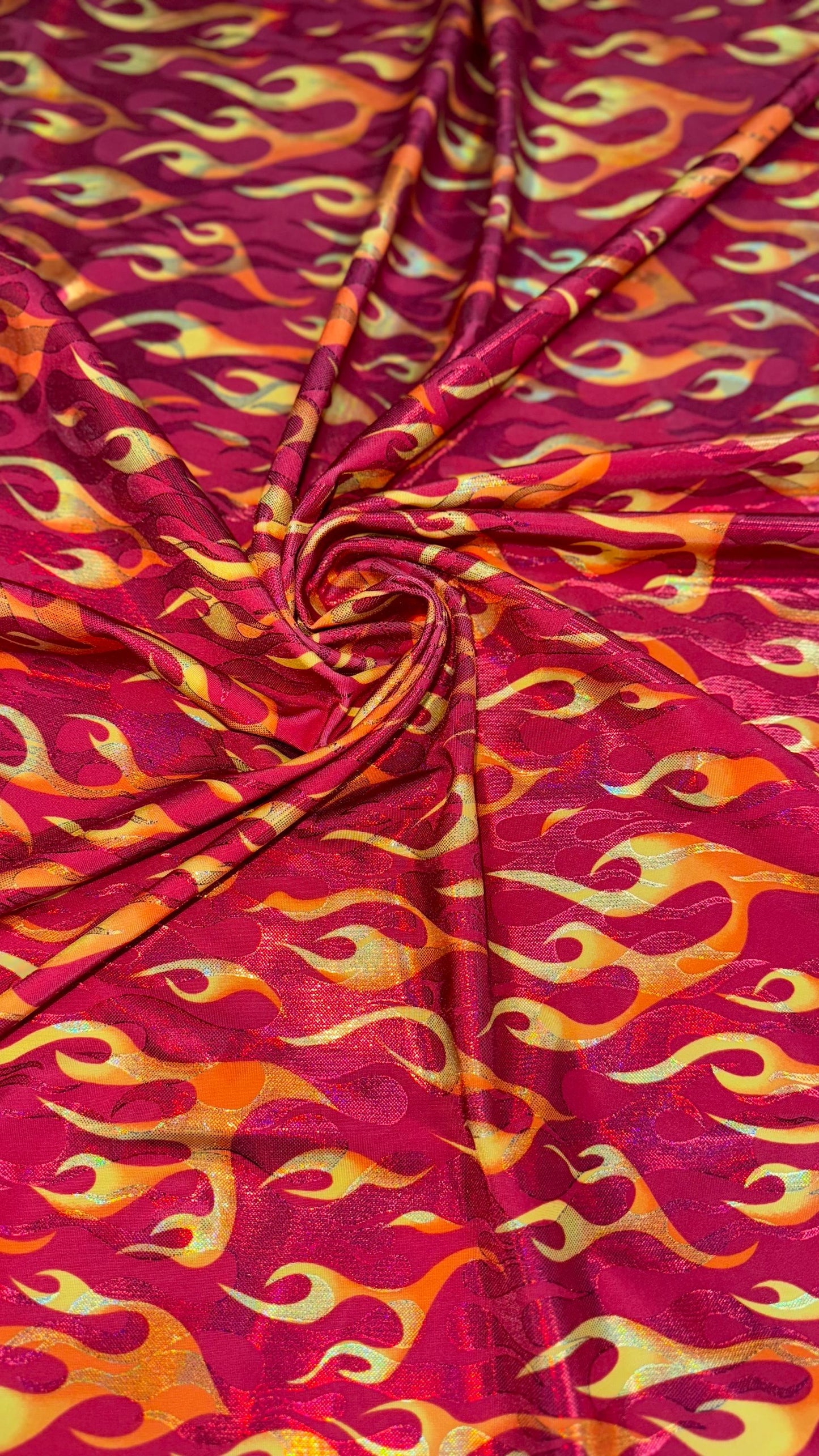 New Hot flames design metallic nylon spandex with foggy foil 4-way stretch 58/60” Sold by the YD. Ships Worldwide from Los Angeles CA USA
