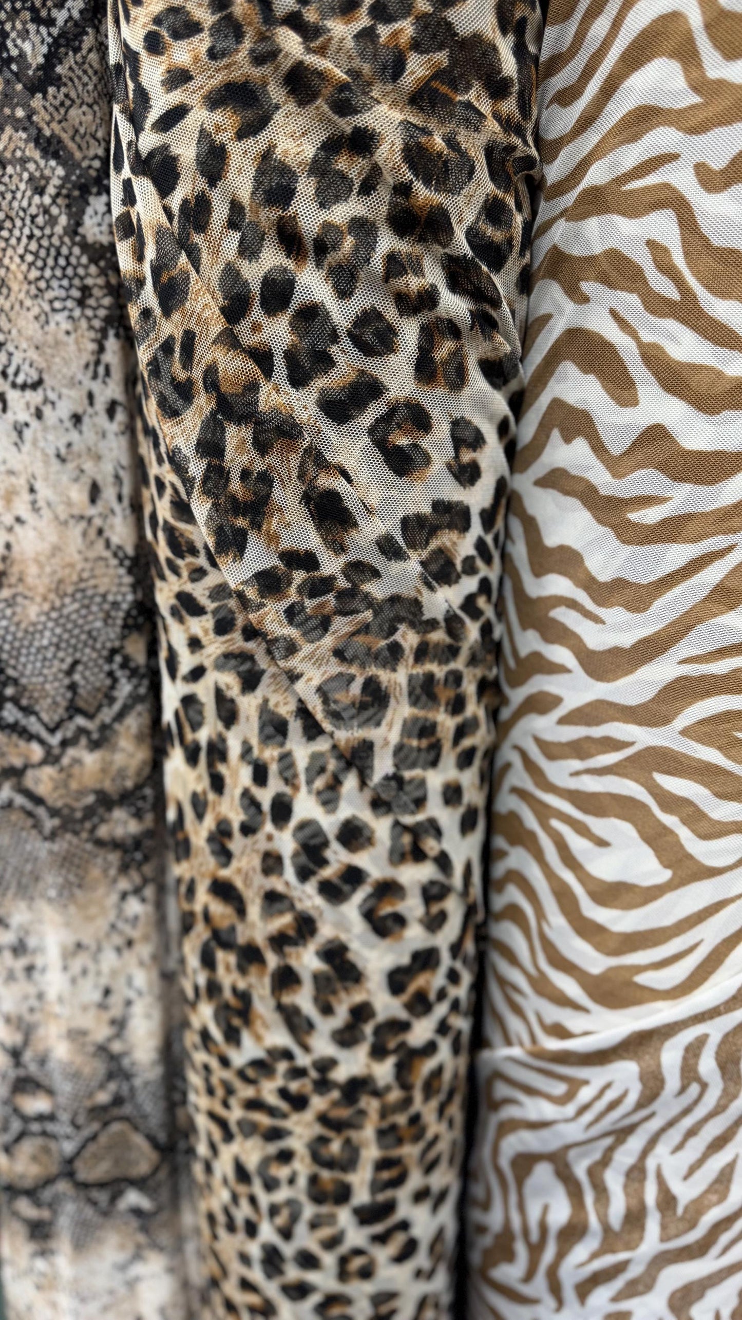 New Exotic Animals prints  designs pin power mesh  4-way stretch nylon spandex  58/60” Sold by the YD. Ships worldwide from Los Ángeles CA