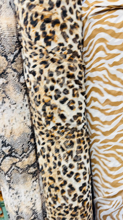 New Exotic Animals prints  designs pin power mesh  4-way stretch nylon spandex  58/60” Sold by the YD. Ships worldwide from Los Ángeles CA