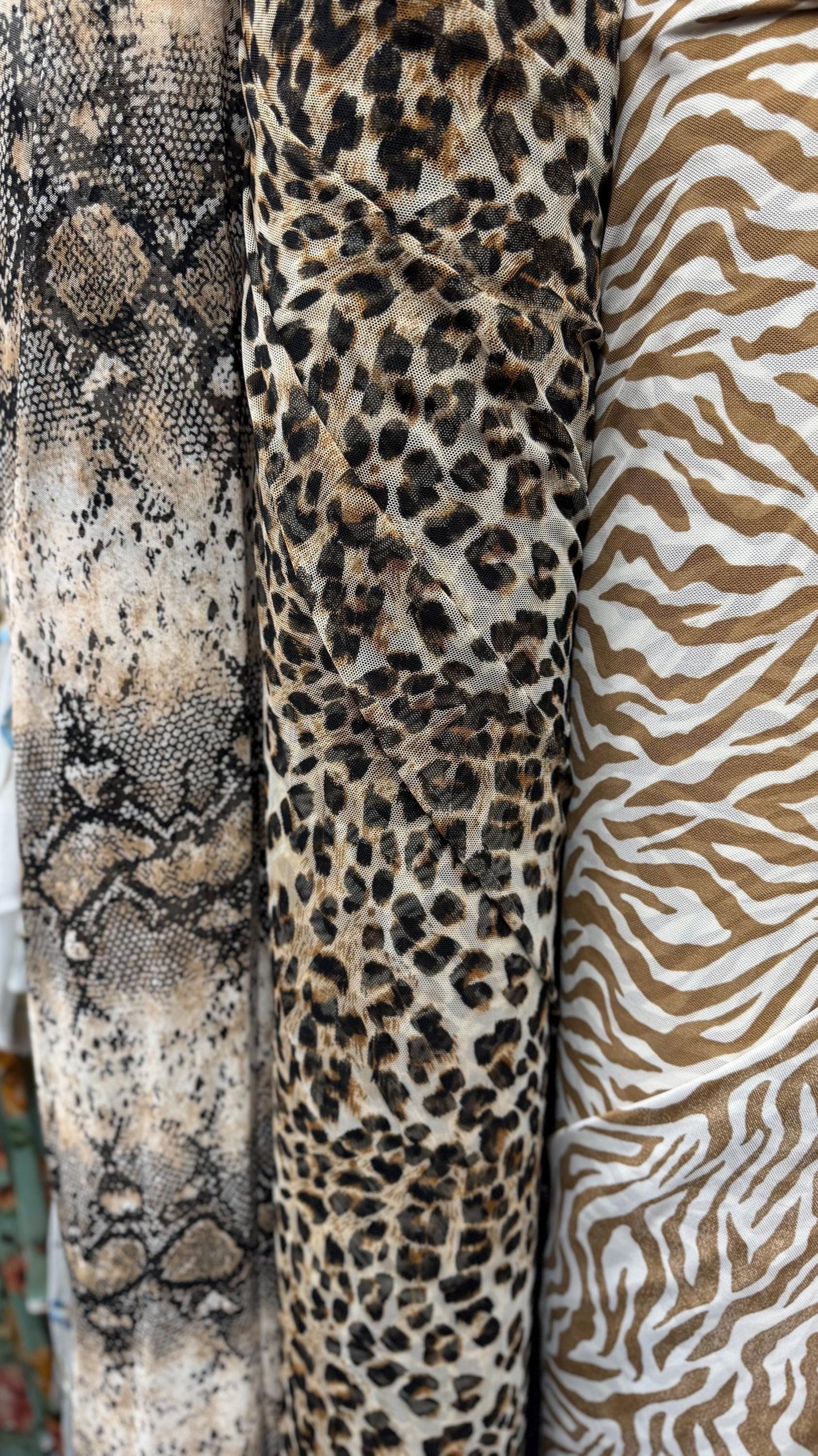 New Exotic Animals prints  designs pin power mesh  4-way stretch nylon spandex  58/60” Sold by the YD. Ships worldwide from Los Ángeles CA