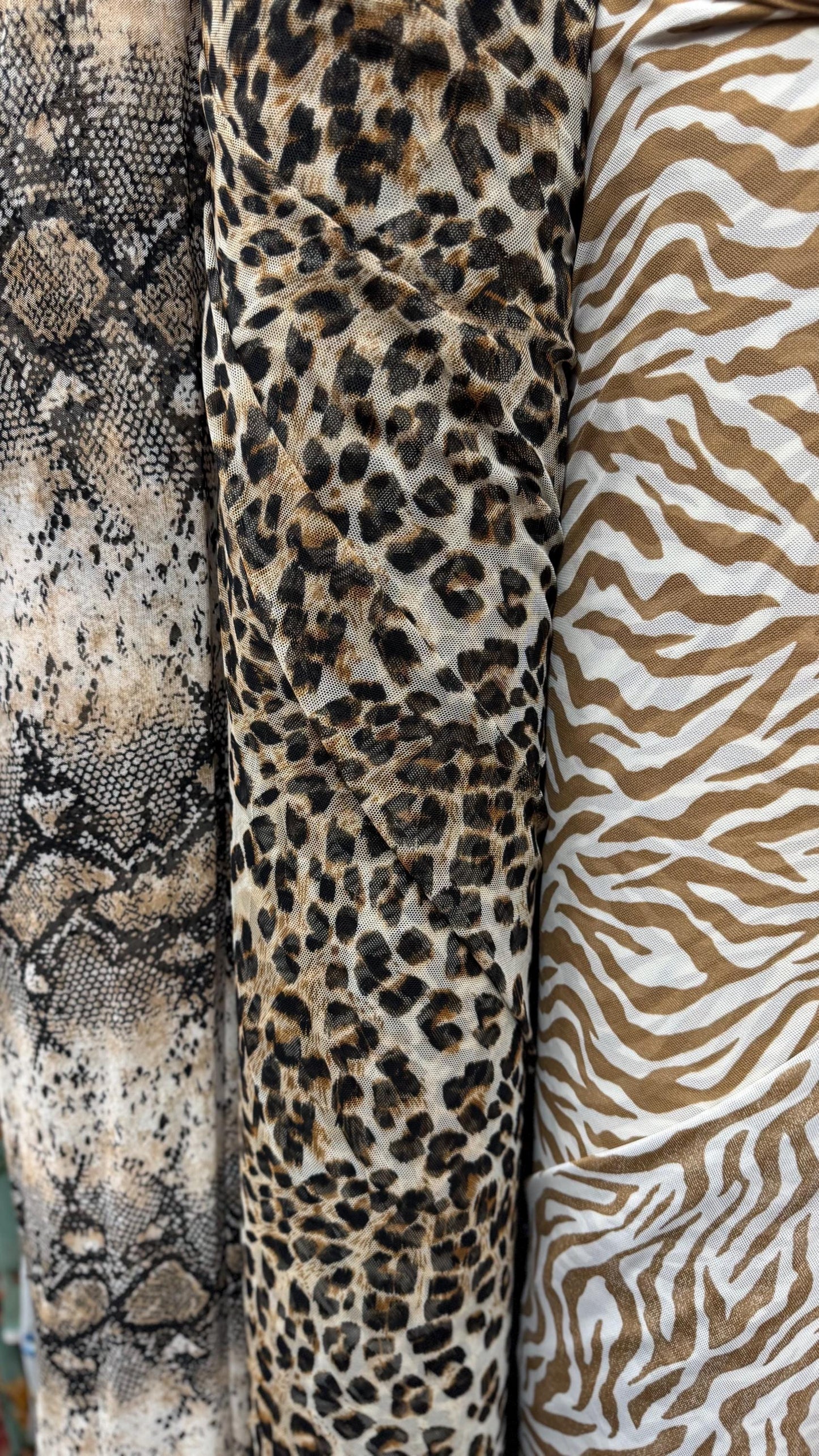 New Exotic Animals prints  designs pin power mesh  4-way stretch nylon spandex  58/60” Sold by the YD. Ships worldwide from Los Ángeles CA