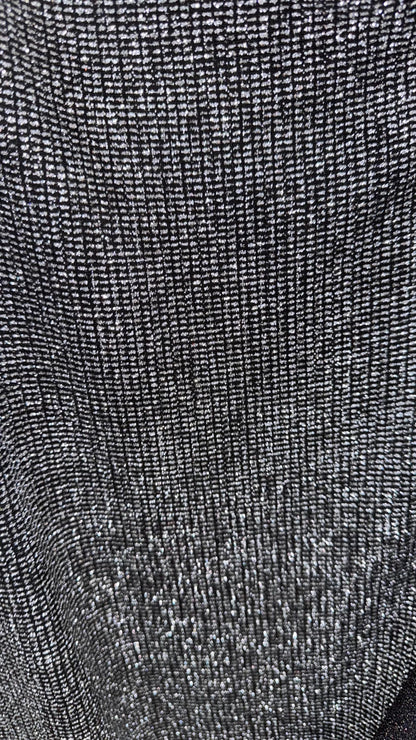 Slinky Geometric design with glitter black/silver 4way stretch 58/60" Sold by the YD. Ships worldwide from Los Angeles California USA.