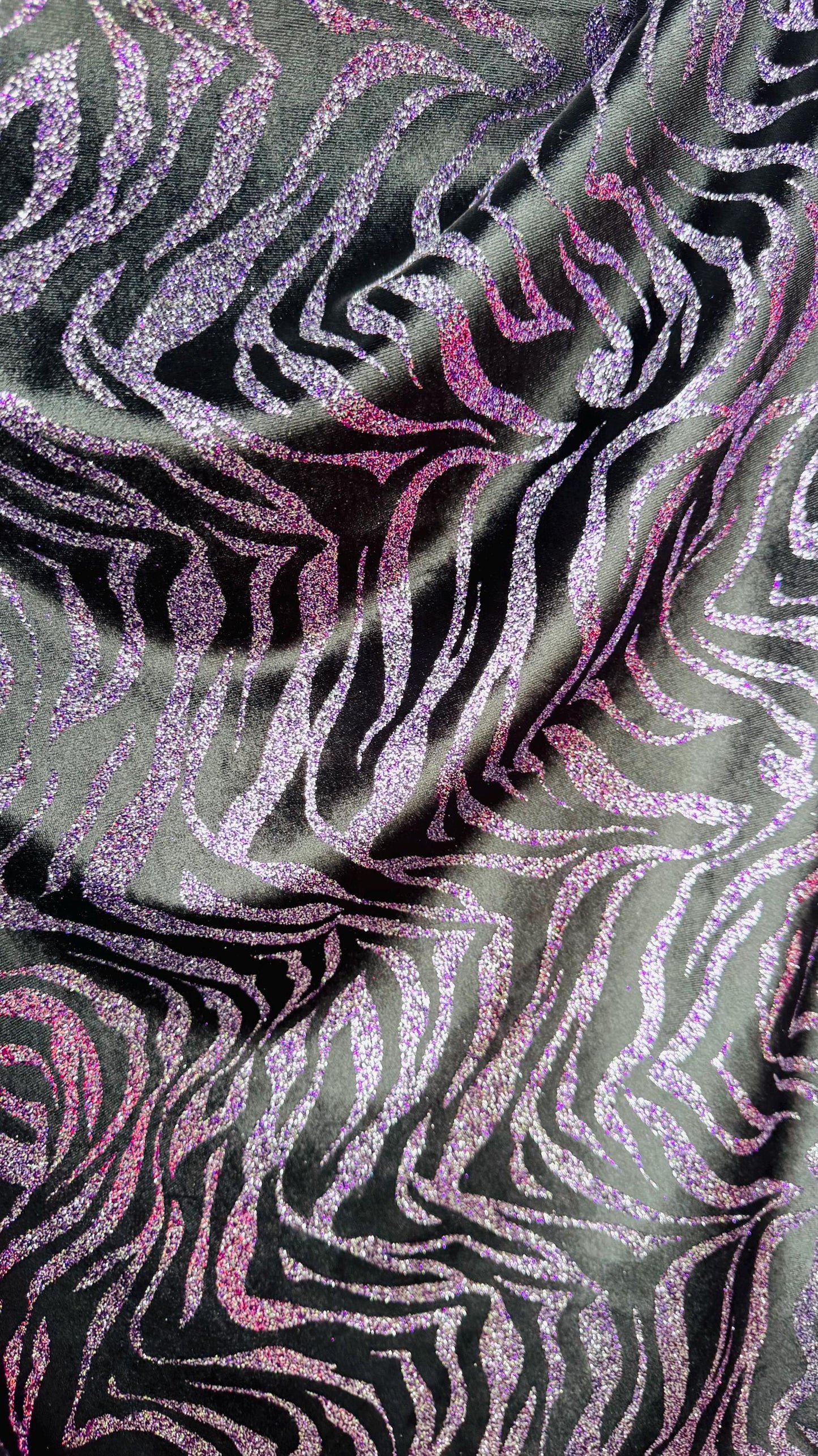 Exotic Zebra design with glitter on heavy stretch velvet 4way 58/60" Sold by the YD. Ships worldwide from Los Angeles California USA.