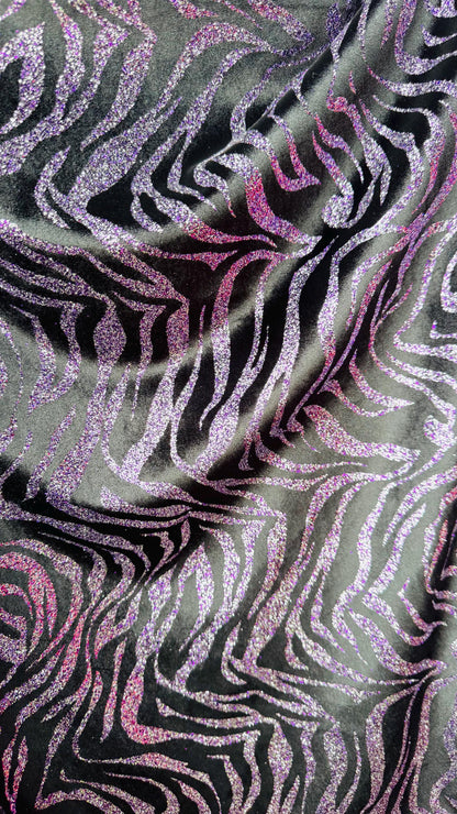 Exotic Zebra design with glitter on heavy stretch velvet 4way 58/60" Sold by the YD. Ships worldwide from Los Angeles California USA.