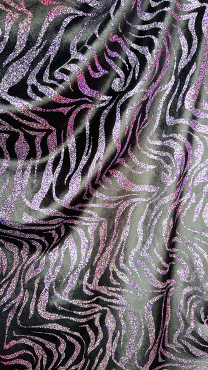 Exotic Zebra design with glitter on heavy stretch velvet 4way 58/60" Sold by the YD. Ships worldwide from Los Angeles California USA.