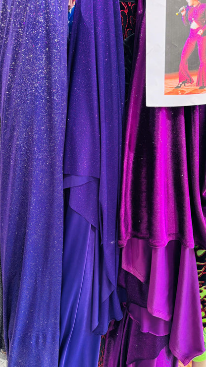 New Selena design eggplant purple stretch velvet with glitter and poly spandex W/Glitter medium weight 4-way stretch 58/60” Sold by the YD