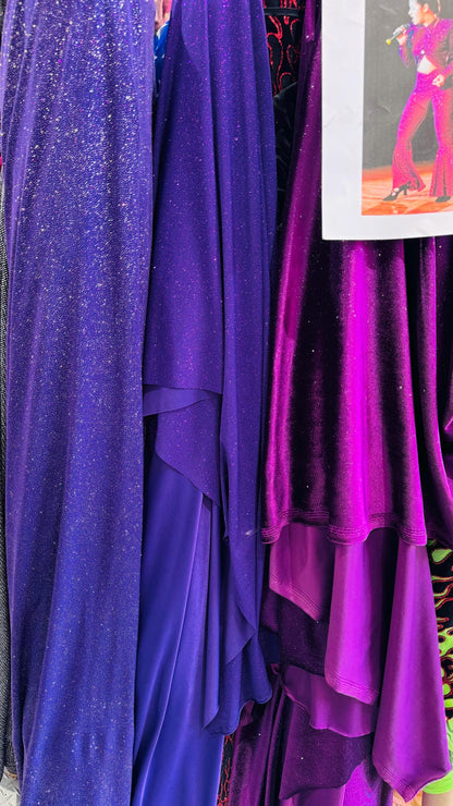 New Selena design eggplant purple stretch velvet with glitter and poly spandex W/Glitter medium weight 4-way stretch 58/60” Sold by the YD