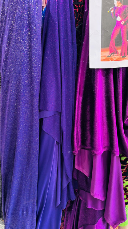 New Selena design eggplant purple stretch velvet with glitter and poly spandex W/Glitter medium weight 4-way stretch 58/60” Sold by the YD
