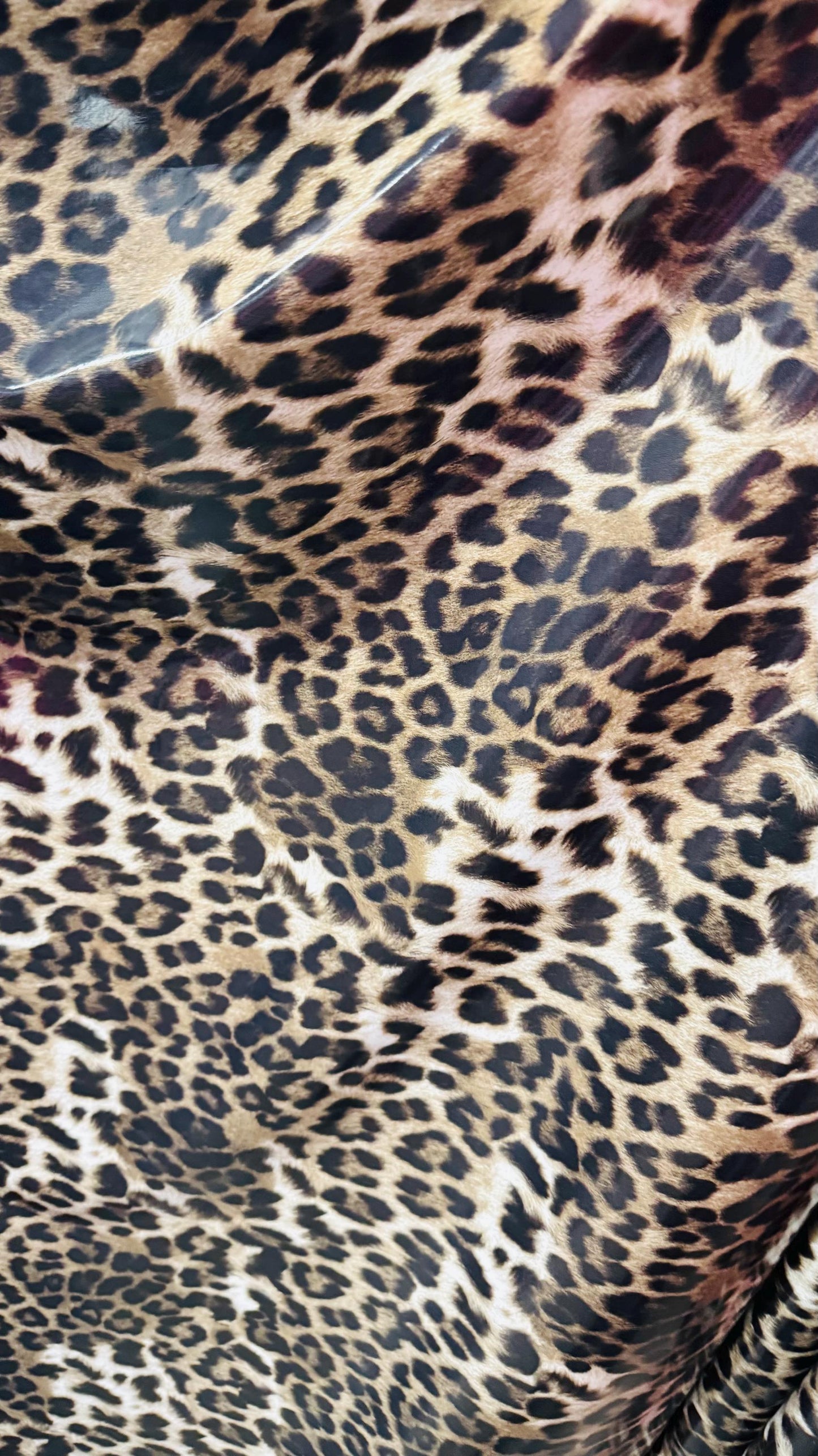 Leopard Exotic design shiny latex high quality nylon spandex vinyl 4-way stretch 58/60” Sold by the YD. Ships worldwide from Los Angeles CA
