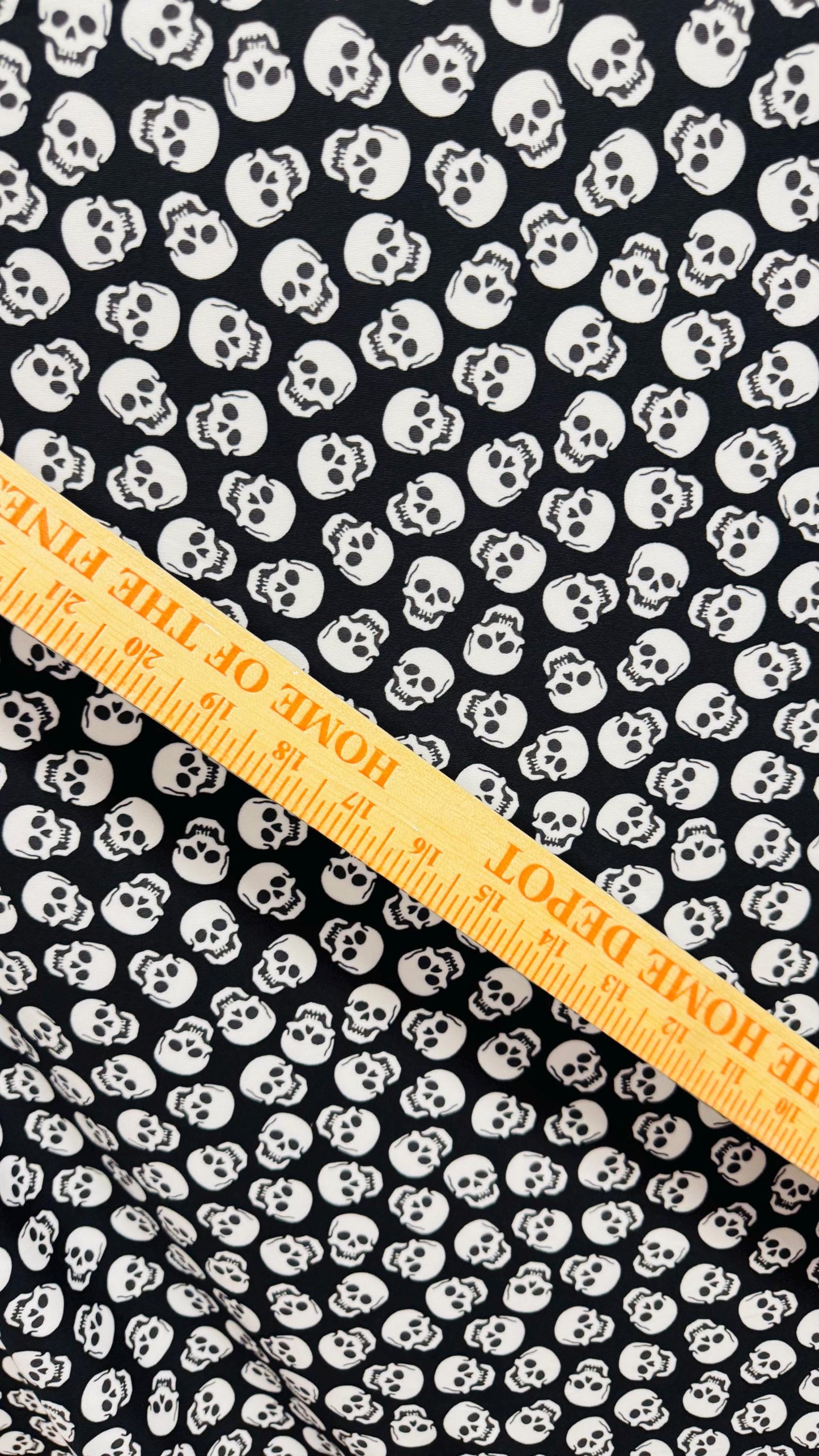 Skull Halloween design Black/White  print  on nylon spandex 4way stretch 58/60" sold by the yd. Ships worldwide from Los Angeles California