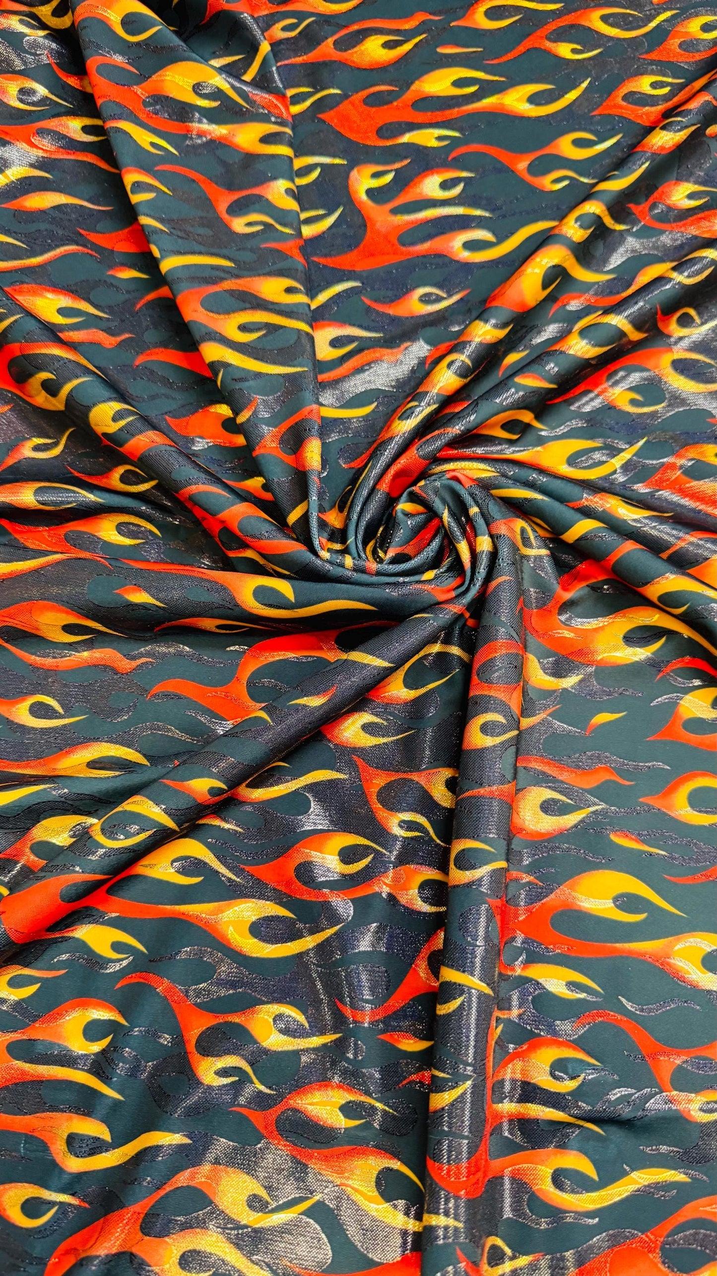 New Hot flames design metallic nylon spandex with foggy foil 4-way stretch 58/60” Sold by the YD. Ships Worldwide from Los Angeles CA USA