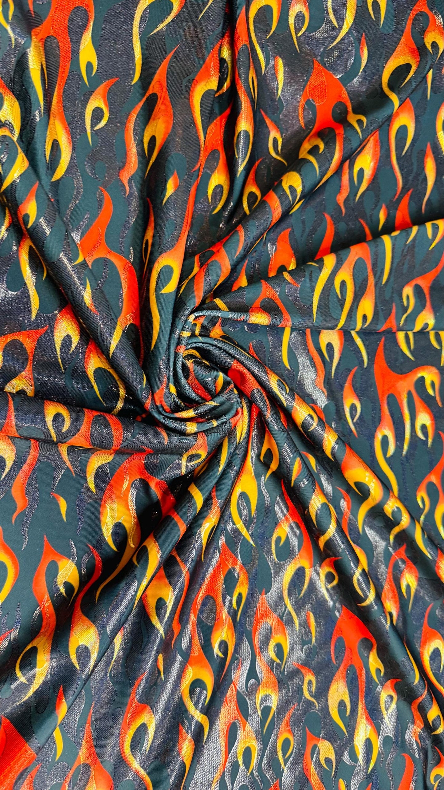 New Hot flames design metallic nylon spandex with foggy foil 4-way stretch 58/60” Sold by the YD. Ships Worldwide from Los Angeles CA USA