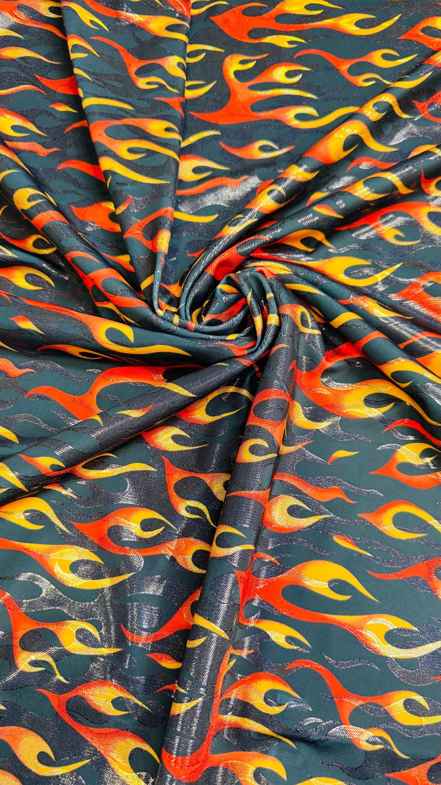 New Hot flames design metallic nylon spandex with foggy foil 4-way stretch 58/60” Sold by the YD. Ships Worldwide from Los Angeles CA USA