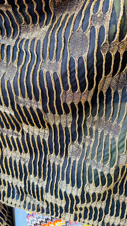 Mummy design Metallic poly spandex 4-way stretch 58/60” Sold by the YD. Ships Worldwide from Los Angeles California USA