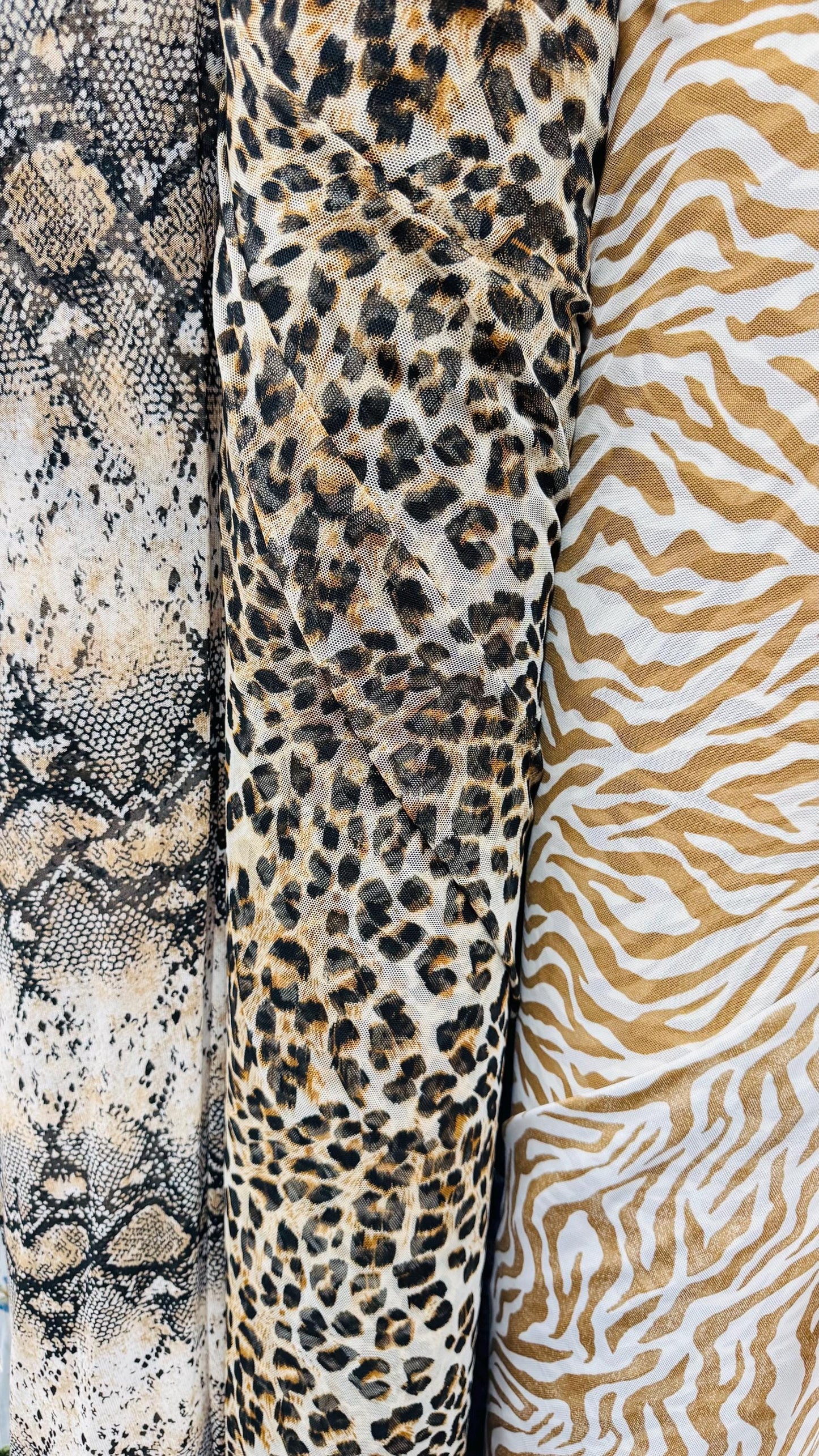 New Exotic Animals prints  designs pin power mesh  4-way stretch nylon spandex  58/60” Sold by the YD. Ships worldwide from Los Ángeles CA