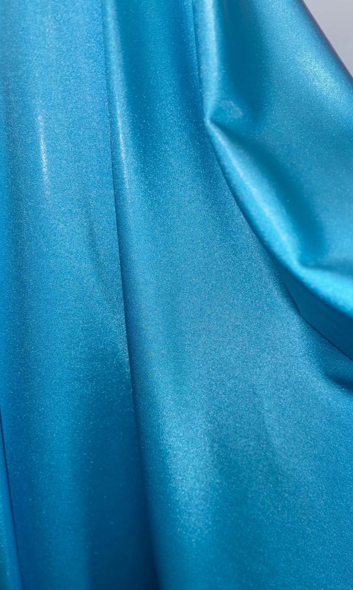 New foggy foil metallic nylon spandex Aqua color 4way Stretch 58/60" Sold by the YD. Ships worldwide from Los Angeles California USA.
