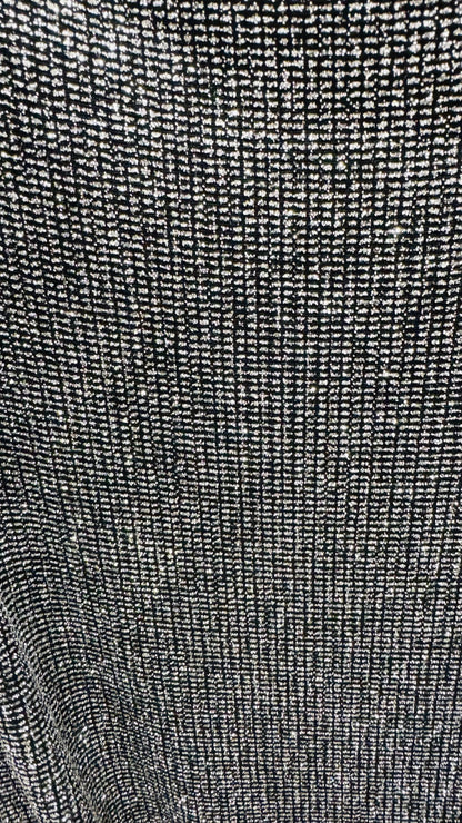 Slinky Geometric design with glitter black/silver 4way stretch 58/60" Sold by the YD. Ships worldwide from Los Angeles California USA.