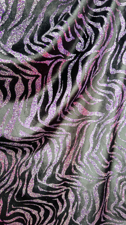 Exotic Zebra design with glitter on heavy stretch velvet 4way 58/60" Sold by the YD. Ships worldwide from Los Angeles California USA.