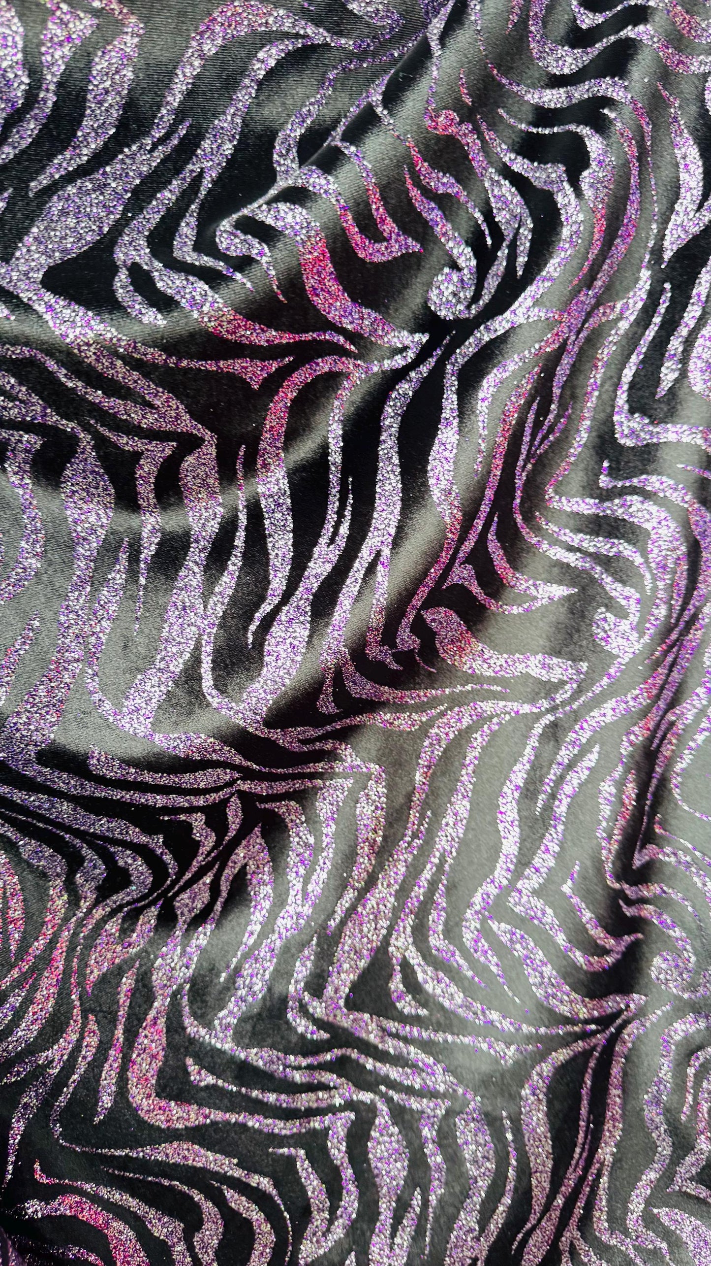 Exotic Zebra design with glitter on heavy stretch velvet 4way 58/60" Sold by the YD. Ships worldwide from Los Angeles California USA.