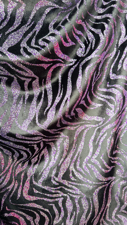 Exotic Zebra design with glitter on heavy stretch velvet 4way 58/60" Sold by the YD. Ships worldwide from Los Angeles California USA.