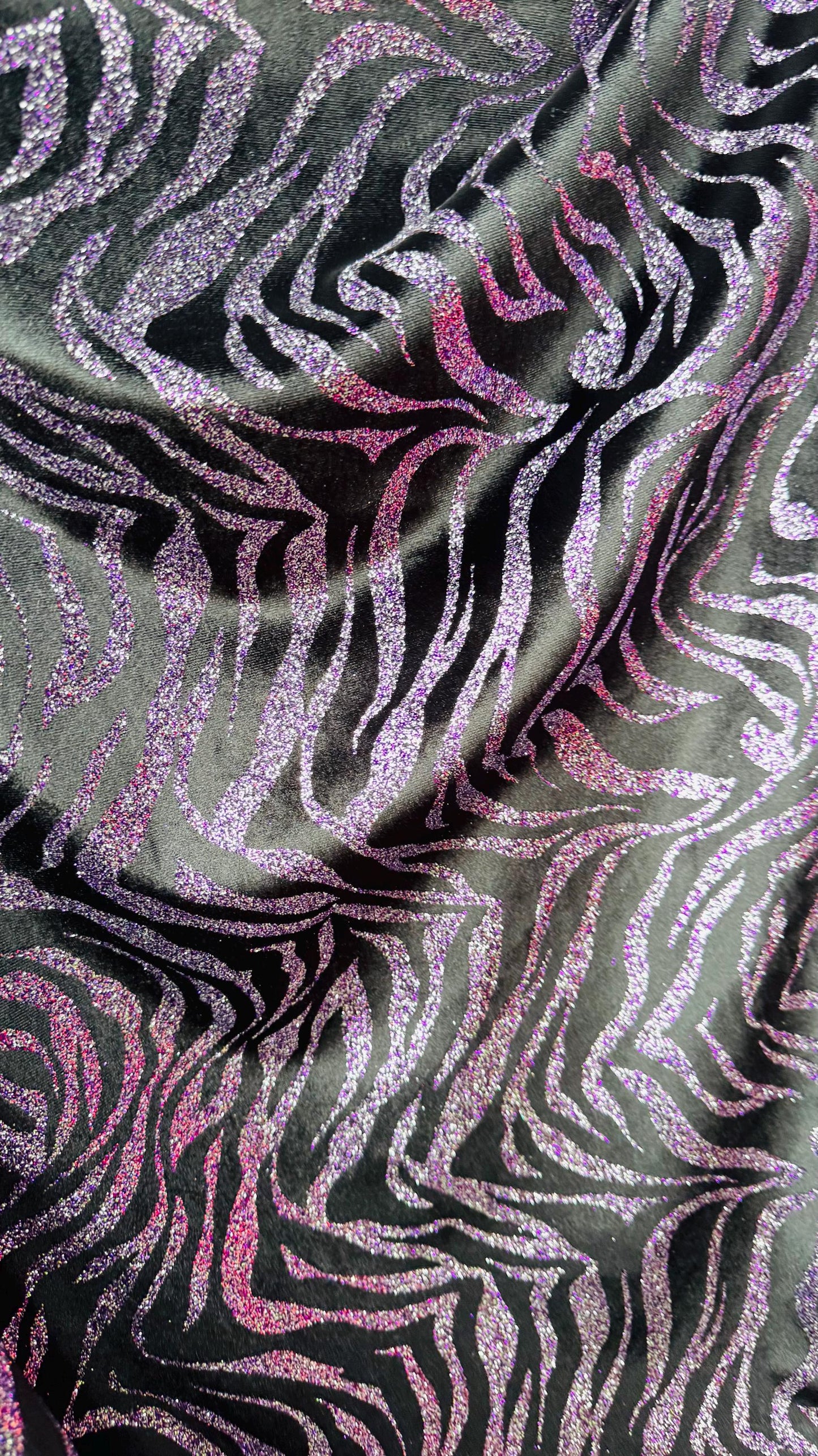 Exotic Zebra design with glitter on heavy stretch velvet 4way 58/60" Sold by the YD. Ships worldwide from Los Angeles California USA.