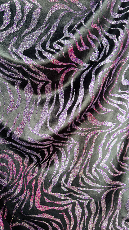 Exotic Zebra design with glitter on heavy stretch velvet 4way 58/60" Sold by the YD. Ships worldwide from Los Angeles California USA.
