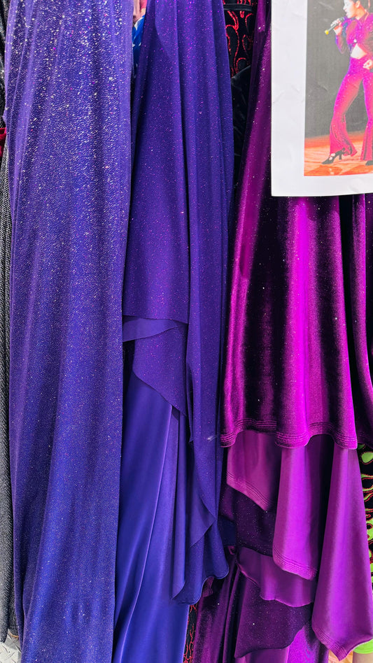 New Selena design eggplant purple stretch velvet with glitter and poly spandex W/Glitter medium weight 4-way stretch 58/60” Sold by the YD