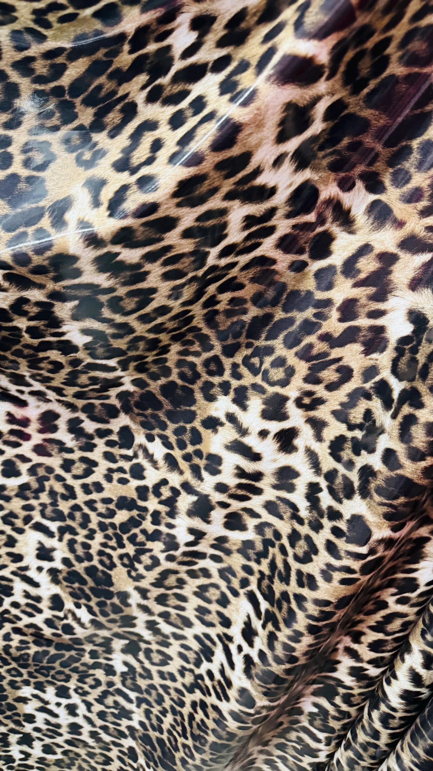 Leopard Exotic design shiny latex high quality nylon spandex vinyl 4-way stretch 58/60” Sold by the YD. Ships worldwide from Los Angeles CA