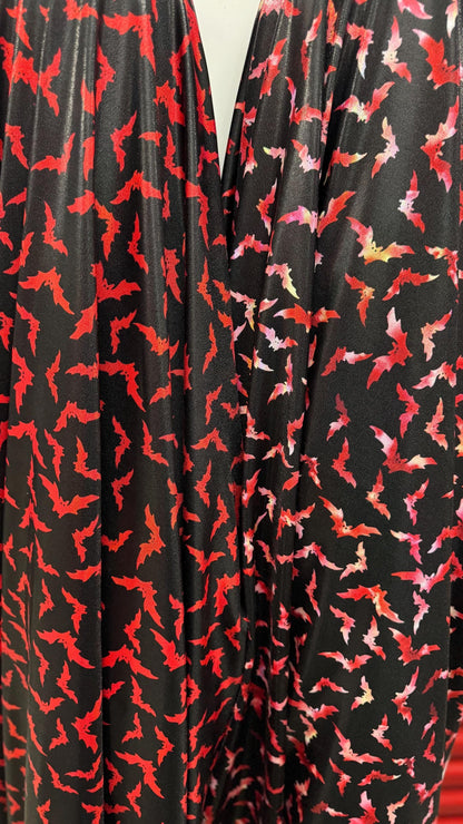New Bats design on Iridescent metallic nylon spandex with foggy foil  4way stretch 58/60" Sold by the YD. Ships worldwide from Los Angeles