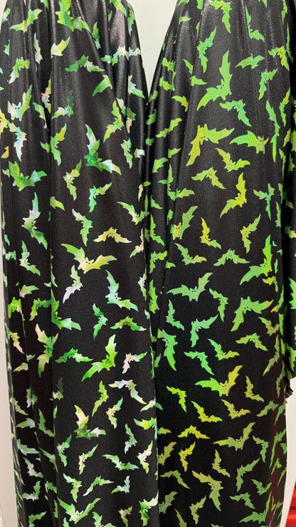 New Bats design on Iridescent metallic nylon spandex with foggy foil  4way stretch 58/60" Sold by the YD. Ships worldwide from Los Angeles