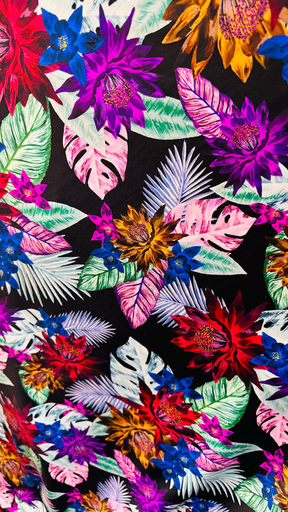 New print nylon spandex flower design Black multicolor 4way stretch 58/60" Sold by the YD. Ships worldwide from Los Angeles California USA.