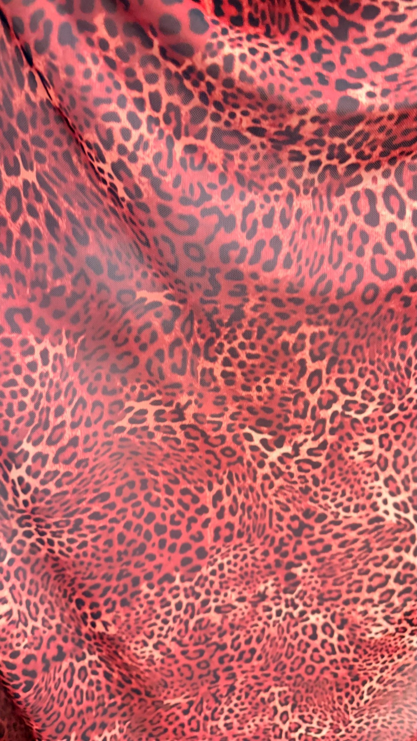 New exotic leopard design Rust/Brown print on power mesh 4-way stretch 58/60” Sold by the YD. Ships worldwide from Los Angeles California