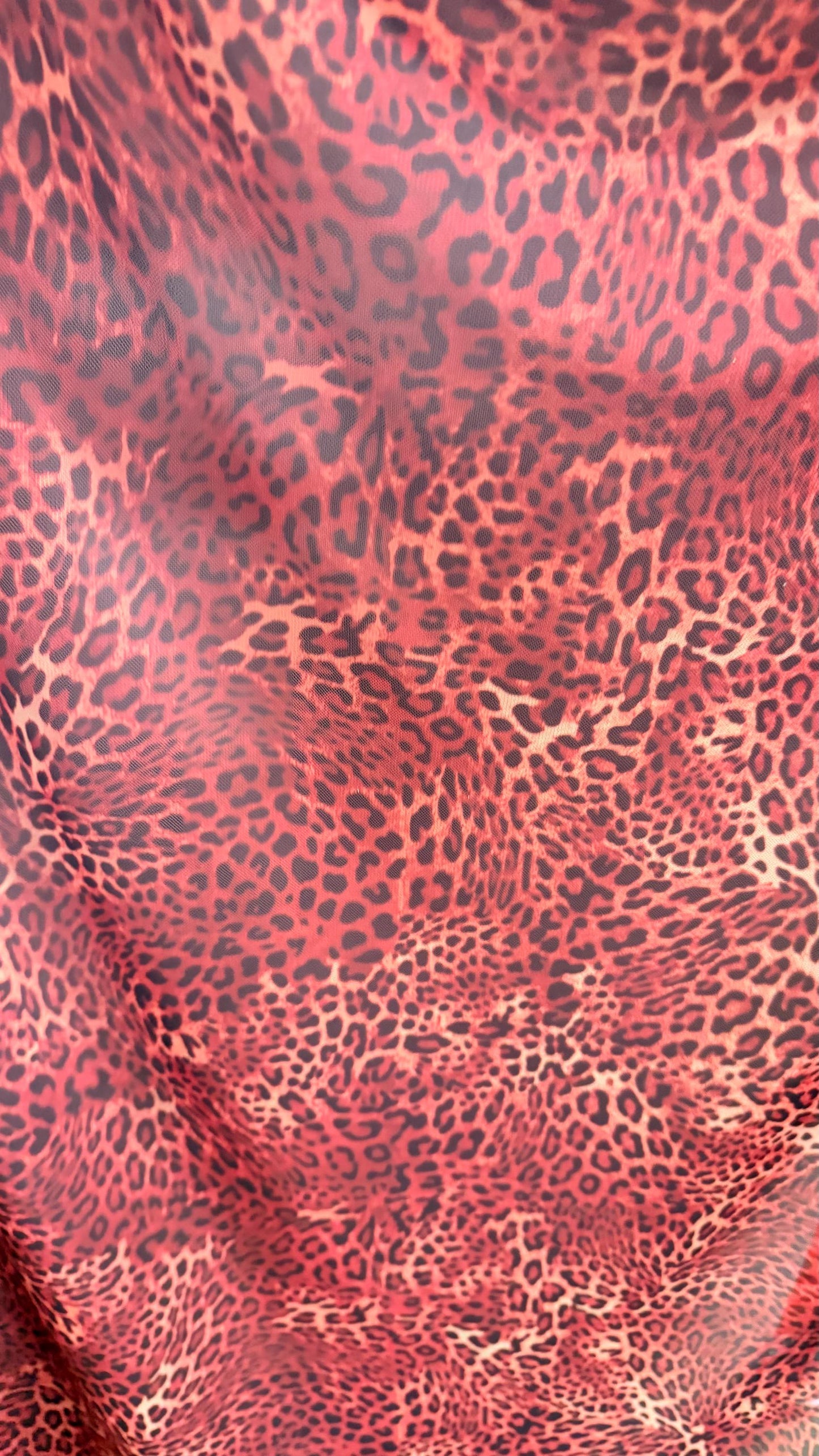 New exotic leopard design Rust/Brown print on power mesh 4-way stretch 58/60” Sold by the YD. Ships worldwide from Los Angeles California
