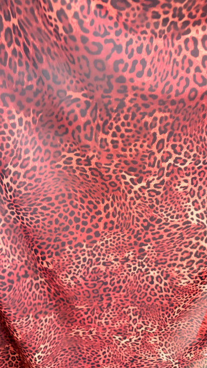 New exotic leopard design Rust/Brown print on power mesh 4-way stretch 58/60” Sold by the YD. Ships worldwide from Los Angeles California