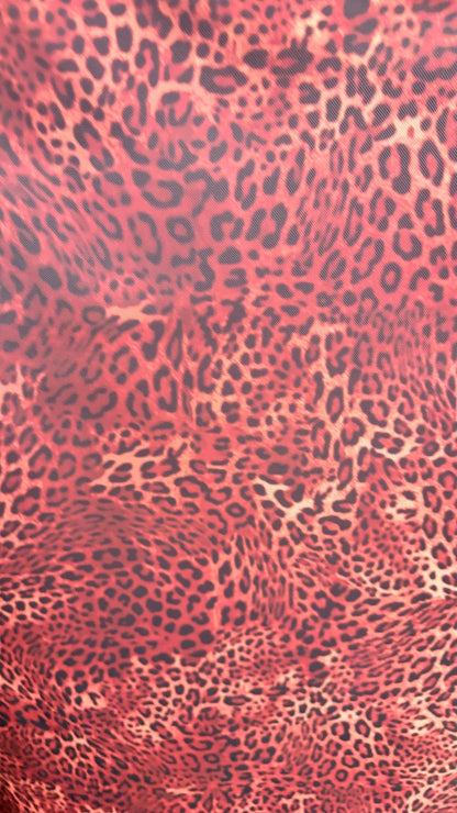 New exotic leopard design Rust/Brown print on power mesh 4-way stretch 58/60” Sold by the YD. Ships worldwide from Los Angeles California