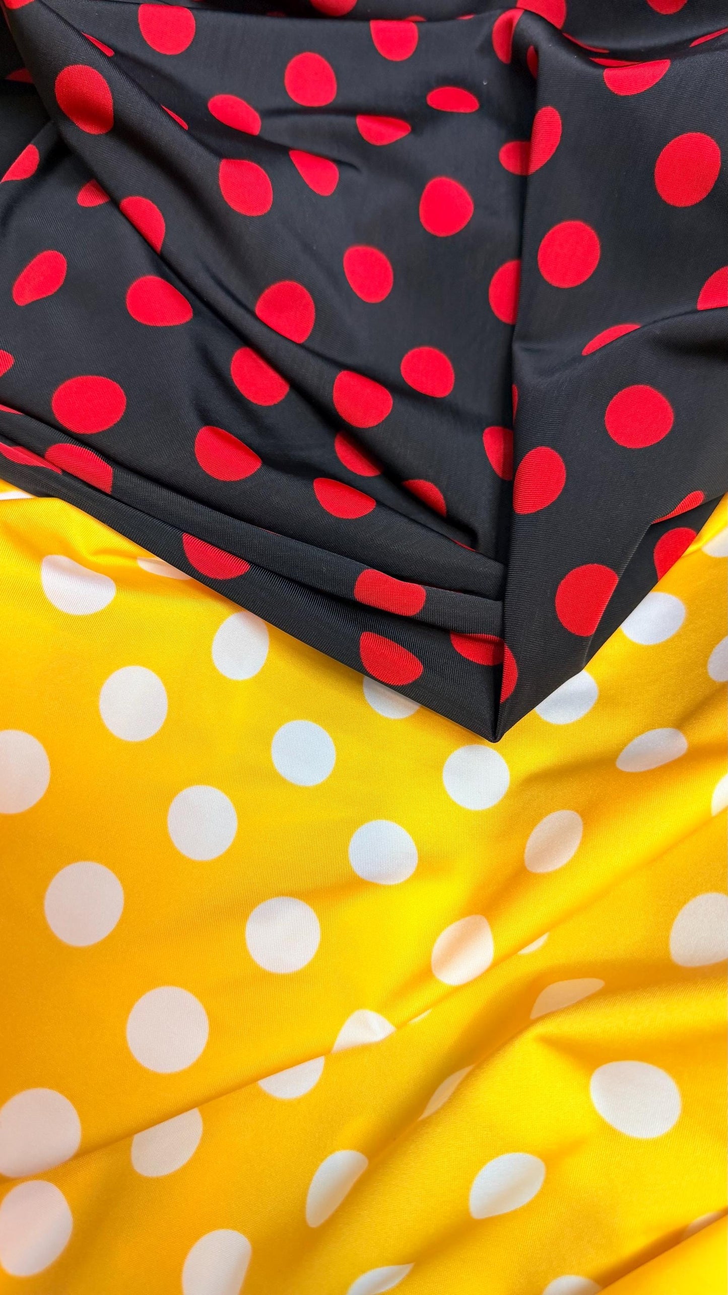 Polka dots print medium size on nylon spandex 4way stretch  58/60" sold by the Yd. Ships worldwide from Los Angeles California USA.