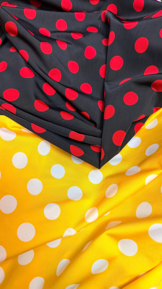 Polka dots print medium size on nylon spandex 4way stretch  58/60" sold by the Yd. Ships worldwide from Los Angeles California USA.