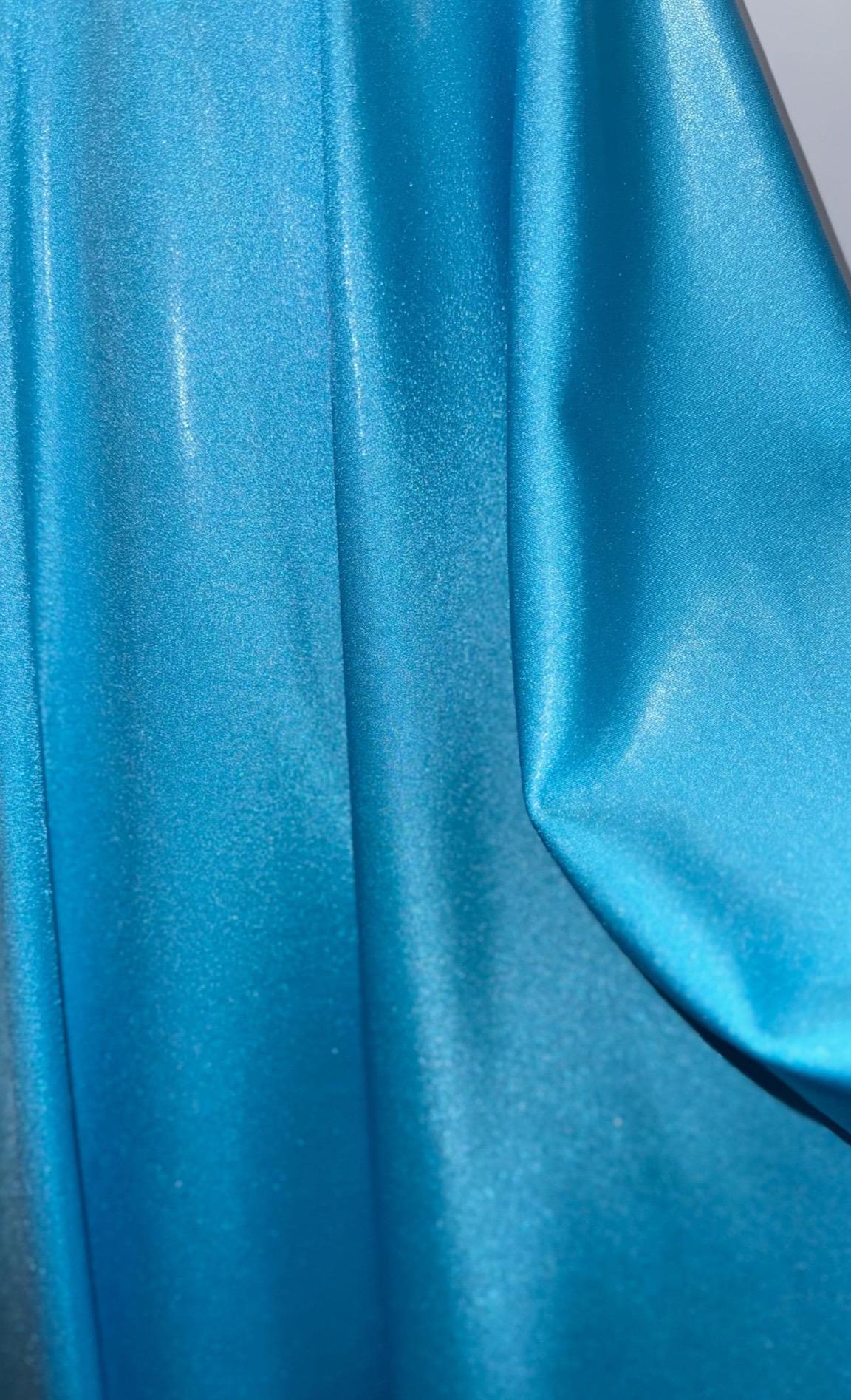 New foggy foil metallic nylon spandex Aqua color 4way Stretch 58/60" Sold by the YD. Ships worldwide from Los Angeles California USA.