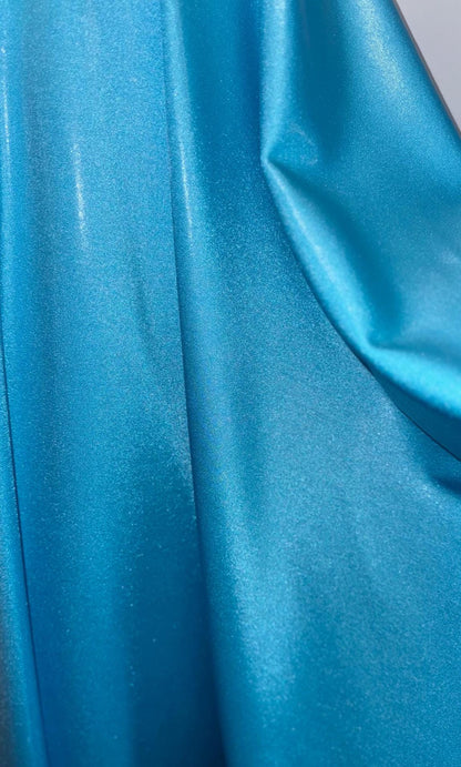 New foggy foil metallic nylon spandex Aqua color 4way Stretch 58/60" Sold by the YD. Ships worldwide from Los Angeles California USA.