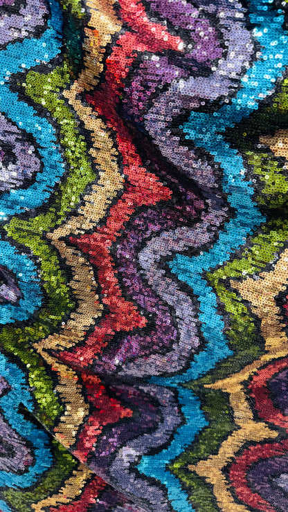 New modern wavy design trans sequins on 4-way stretch power mesh 54/55” Sold by the YD. Ships worldwide from Los Angeles California USA.