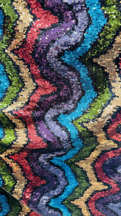New modern wavy design trans sequins on 4-way stretch power mesh 54/55” Sold by the YD. Ships worldwide from Los Angeles California USA.