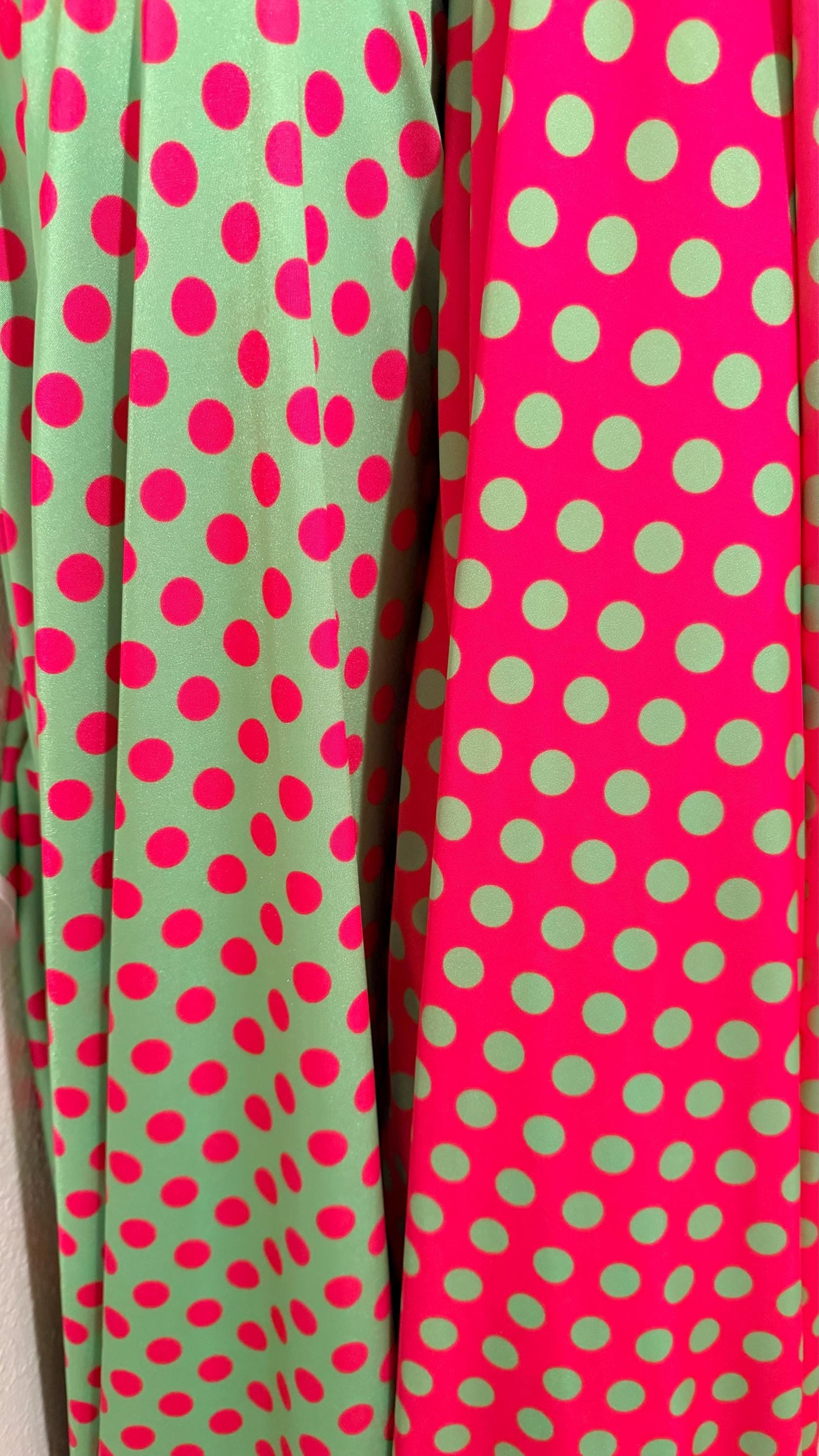 Polka dots design print on shiny  nylon spandex 4way stretch  58/60" sold by the Yd. Ships worldwide from Los Angeles California USA.