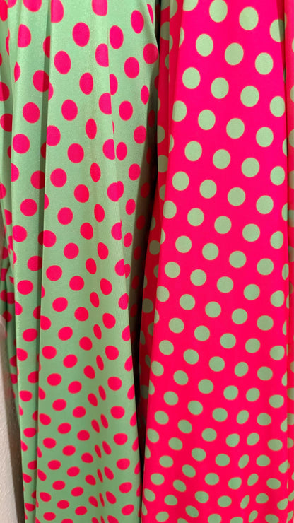 Polka dots design print on shiny  nylon spandex 4way stretch  58/60" sold by the Yd. Ships worldwide from Los Angeles California USA.