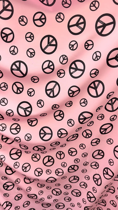 Love and Peace design print on great quality of nylon spandex 4way stretch 58/60" Sold by the YD. Ships worldwide from Los Angeles CA USA