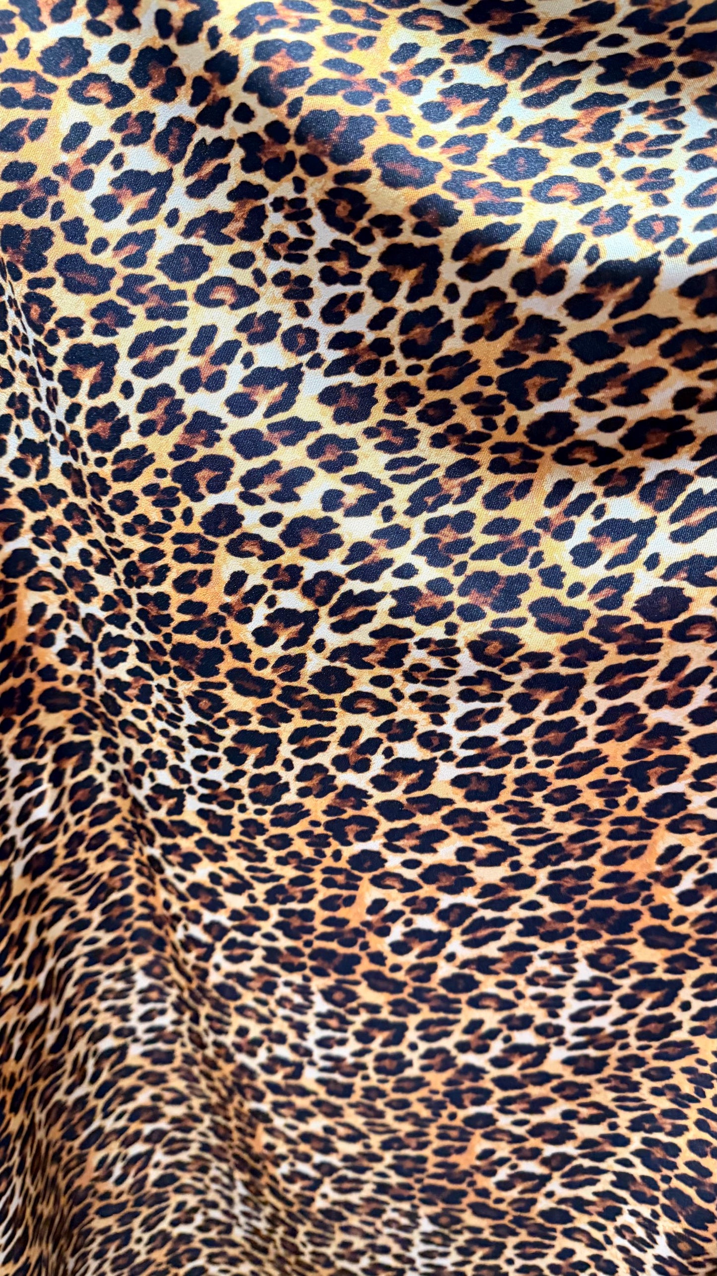 NEW Leopard Exotic design print on nylon Spandex 4-way stretch 58/60” Sold by the YD. Ships worldwide from Los Angeles California USA.